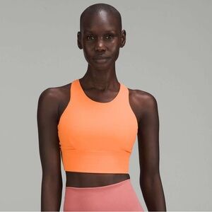 Orange lululemon wonder train top
